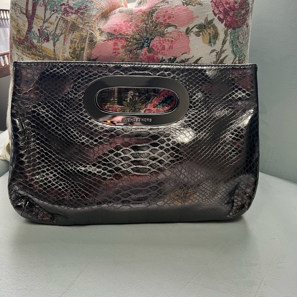 Michael Kors graphite embossed leather clutch.